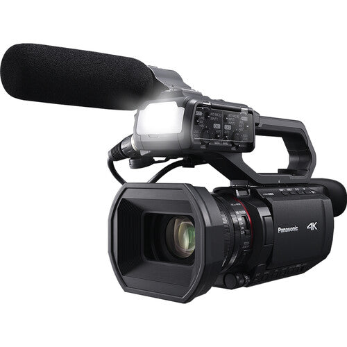 Panasonic HC-X2100 UHD 4K 3G-SDI/HDMI Pro Camcorder with 24x Zoom Bundle + Accessory Package Including 128GB Memory, LED Light, HD Filters, Bag, Editing Software Package & More - Buy Direct & Save